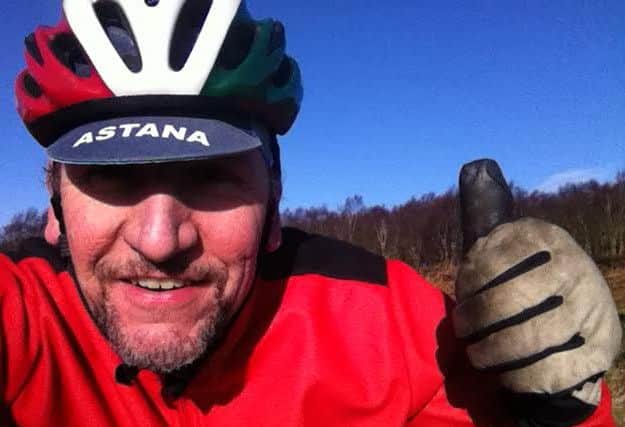 Pictured is roving cycling reporter Jon Cooper.