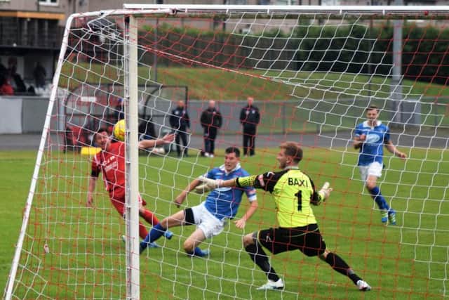 The Bulls snatch a late winner against Stratford in the first qualifying round.