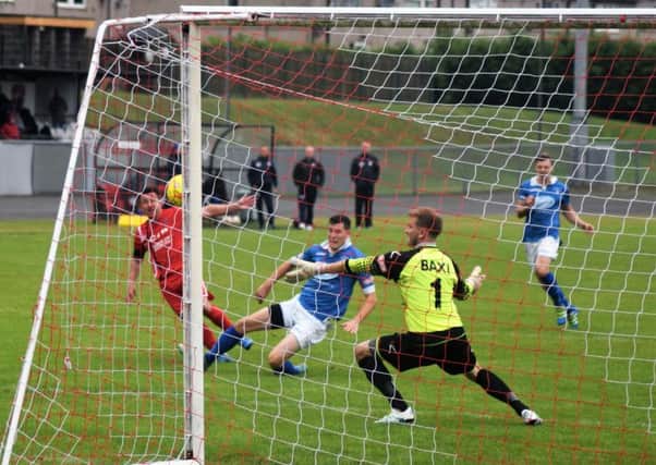 The Bulls snatch a late winner against Stratford in the first qualifying round.