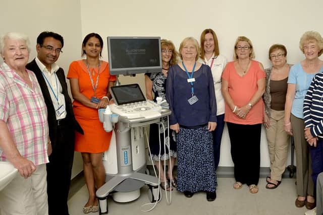 Pictured after raisin g Â£20,000 towards a new ultrasound machine at King's Mil Hospital: L-r:  Amazon Beryl, Consultant Breast Surgeon Ali Jahan, Consultant Radiologist Amanjot Kasuppiah, Amazon Lesley, Specialist Breast Care Nurse Gill Clark, Radiographer Pamela Lanckham, Amazons Janet, Ann, Sandra, Angie, Geoff and Keith.
