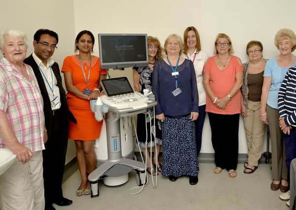 Pictured after raisin g Â£20,000 towards a new ultrasound machine at King's Mil Hospital: L-r:  Amazon Beryl, Consultant Breast Surgeon Ali Jahan, Consultant Radiologist Amanjot Kasuppiah, Amazon Lesley, Specialist Breast Care Nurse Gill Clark, Radiographer Pamela Lanckham, Amazons Janet, Ann, Sandra, Angie, Geoff and Keith.