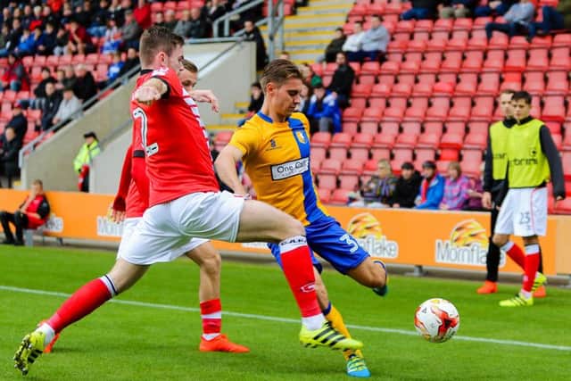 Mansfield Town's Danny Rose attempts to make the pass - Pic by Chris Holloway