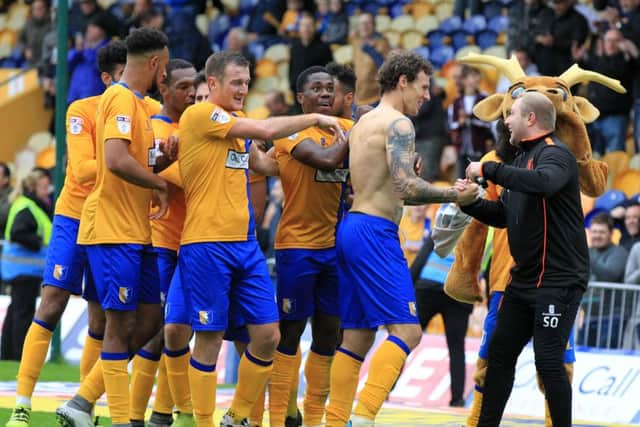 Mansfield Town v Notts County, Saturday October 8th 2016. Mansfield Town player Darius Henderson celebrates after scoring the 3rd goal. Picture: Chris Etchells