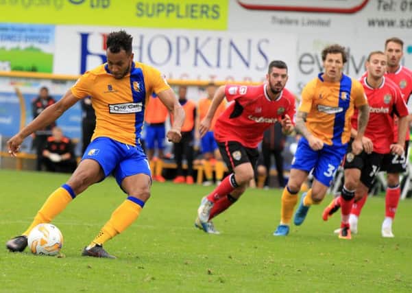 Mansfield Town v Notts County, Saturday October 8th 2016. Mansfield Town player Matt Green scores from the penalty spot to take his 2nd goal of the game. Picture: Chris Etchells