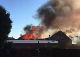 The video shows the church, located on Bosworth Street, engulfed in flames.