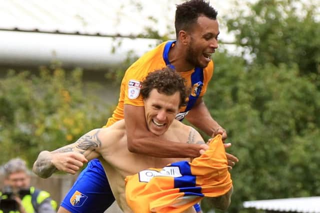 Mansfield Town v Notts County, Saturday October 8th 2016. Mansfield Town player Darius Henderson celebrates after scoring the 3rd goal. Picture: Chris Etchells