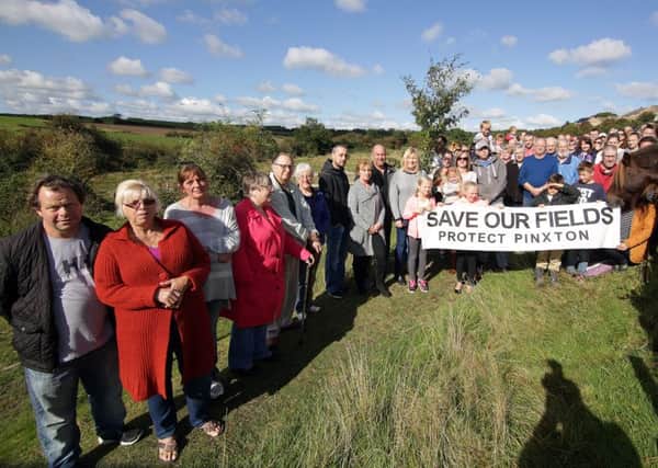 Protesters gather on the greenfields behind Talbot Street which is narrow and busy and where developers want to build 250 houses, United Kingdom on 2 October 2016. Photo by Glenn Ashley.