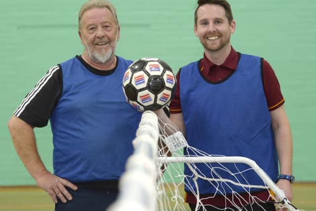 A Walking Football game takes place at Dukeries Leisure Centre, New Ollerton. One of the older players, Dave Bellamy with organiser Dave Long, right
Picture: Sarah Washbourn