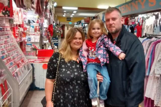 Brian and Michelle Garner from Sutton, with daughter Lois (3) at Sutton Indoor Market.