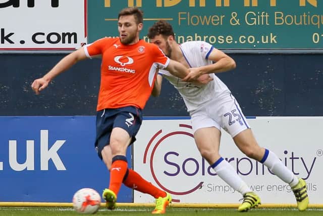 Mansfield Town's Alex
Iacovitti is held back - Pic Chris Holloway