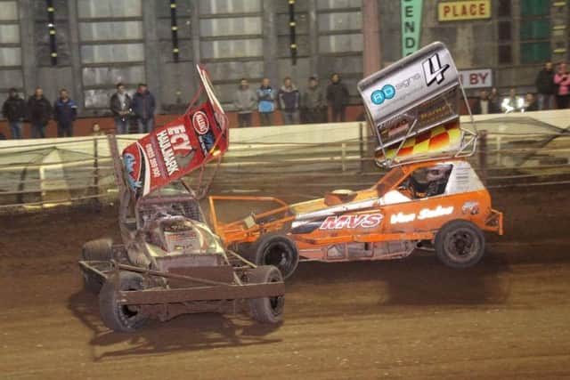 BELLE VUE BATTLE -- Dan Johnson attacks the new champion, Rob Speak, in the final showdown at Belle Vue, Manchester. (PHOTO BY: Anthony Jenkins and Faye Johnson).