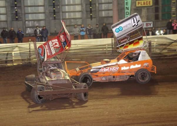 BELLE VUE BATTLE -- Dan Johnson attacks the new champion, Rob Speak, in the final showdown at Belle Vue, Manchester. (PHOTO BY: Anthony Jenkins and Faye Johnson).