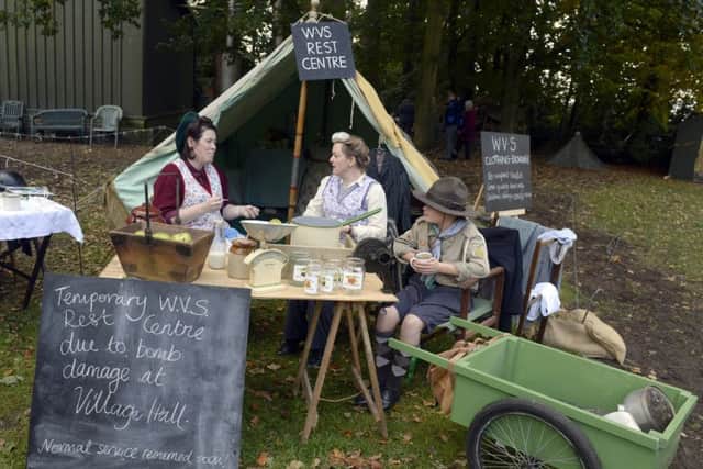 WARTIME SOLACE -- a WRVS rest centre, re-enacted by Carol Deane and Paula Westerside-Downes and her 12-year-old son, Finley. (PHOTO BY: Sarah Washbourn)