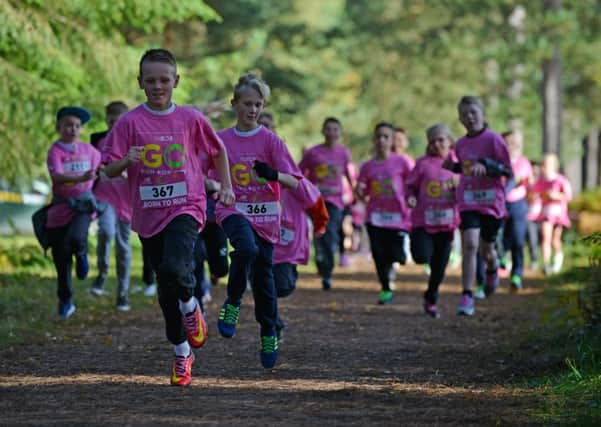 RUN FOREST, RUN! -- youngsters charging through the pictureque Sherwood Pines Forest Park. (PHOTO BY: Rachel Atkins)