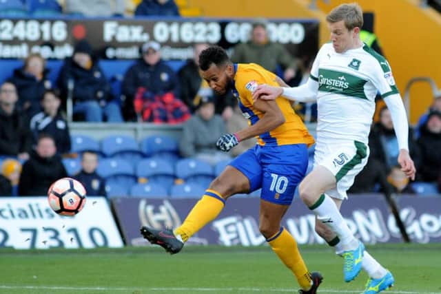 Mansfield Town v Plymouth Argyle.
Matt Green takes an early shot on goal in the first half.