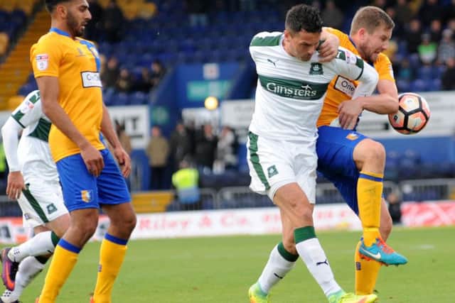 Mansfield Town v Plymouth Argyle.Jamie McGuire in first half action at the One Call Stadium on Saturday afternoon.