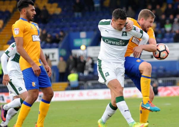 Mansfield Town v Plymouth Argyle.
Jamie McGuire in first half action at the One Call Stadium on Saturday afternoon.