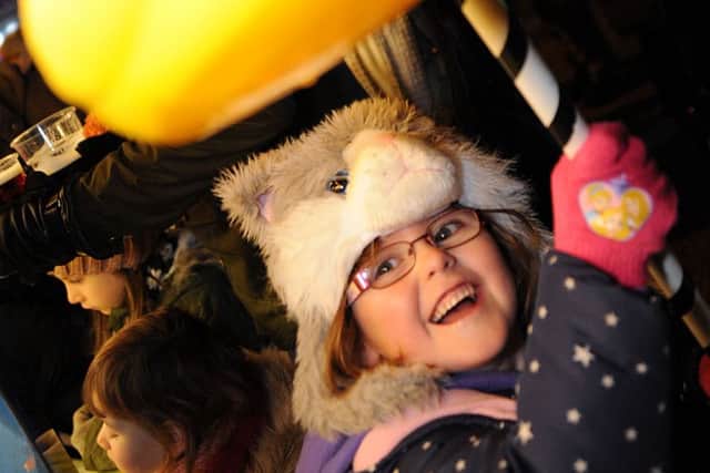 Mansfield Woodhouse firework event.
Ruby Quincey bags herself a prize on the hook-a-duck stand.