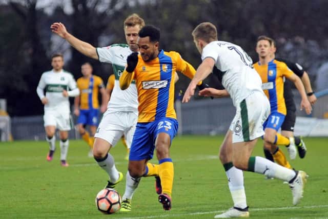Mansfield Town v Plymouth Argyle.Ashley Hemmings in the thick of it in the second half.