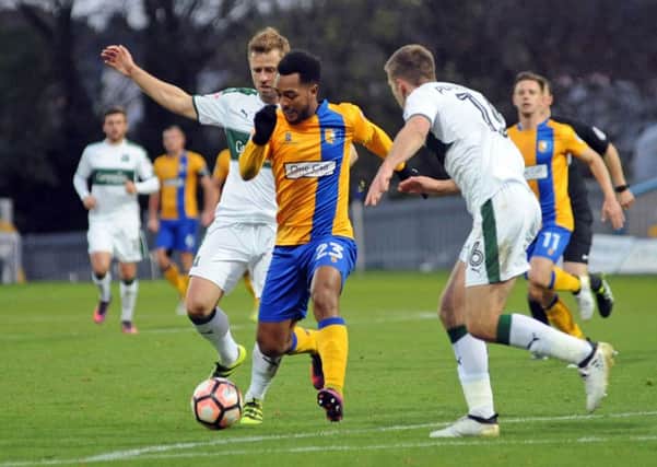 Mansfield Town v Plymouth Argyle.
Ashley Hemmings in the thick of it in the second half.