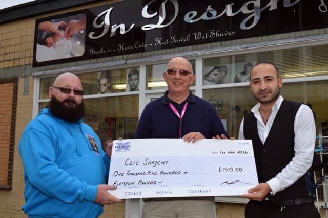 Martin McShane has raised over Â£2000 for Clic Sargent by growing a beard for a year, pictured from left are Martin McShane, Gordon Jeffrey, volunteer for Clic Sargent and Ali Ozcan of In design barbers