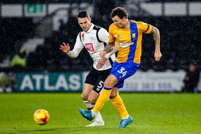 Mansfield Town's Darious Henderson makes the pass - Pic by Chris Holloway