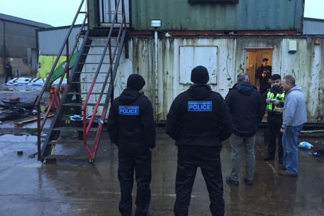 Officers at a scrap metal site in South Yorkshire