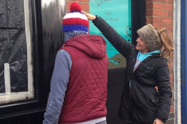 MEANING BUSINESS -- Kat Lichaj, footballer's wife, at her new shop in Annesley.