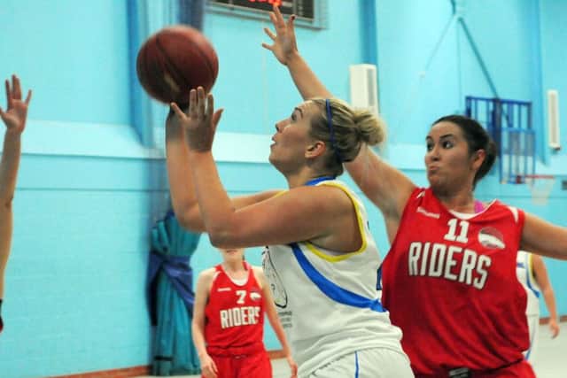 JO RICHARDS -- player/coach led by example with 20 points.