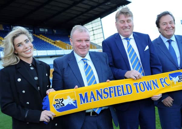 New Mansfield Town manager, Steve Evans at a press conference at the One Call Stadium on Wednesday, flanked by Caroline Radford, assistant manager Paul Raynor and Chairman John Radford.