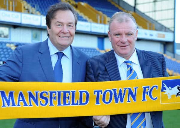 New Mansfield Town manager, Steve Evans at a press conference at the One Call Stadium on Wednesday, with Chairman John Radford.