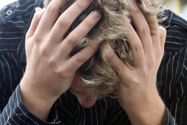 Generic pic of somebody in dispair or worried - pic posed by model