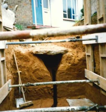 This isn't the first time the ground upened up beneath the street. A 'fissure' crack caused miery in 1981. See our gallery for more photos.