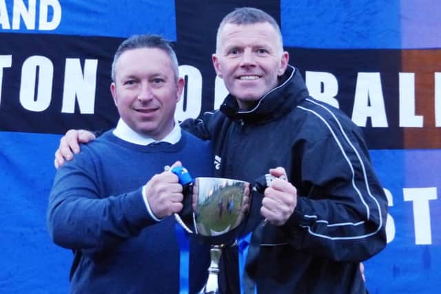 Mark Wilson (left) and manager Craig Weston celebrate Selstons league title win last season.
