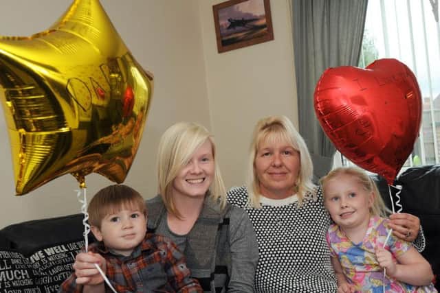 Nathan's children, Wesley and Enya (pictured with his partner Helen and mum) sent balloons up to him in Heaven.