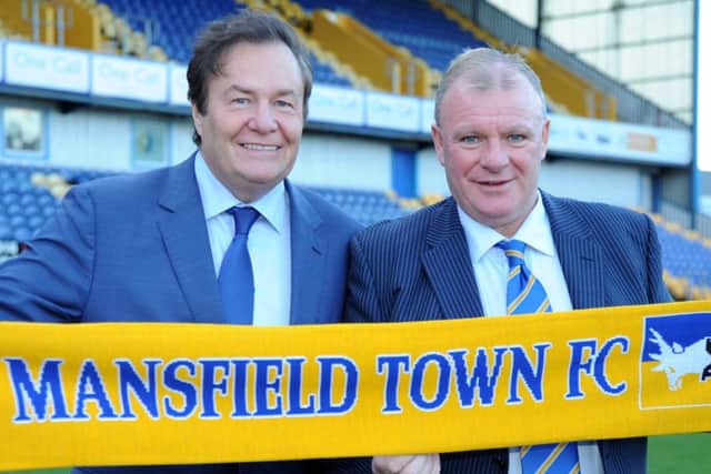 Steve Evans (right) with chairman John Radford.