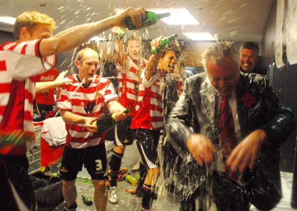 Doncaster Rovers v Leeds Unt at Wembley
Rovers Chairman John Ryan gets soaked in the dressing room