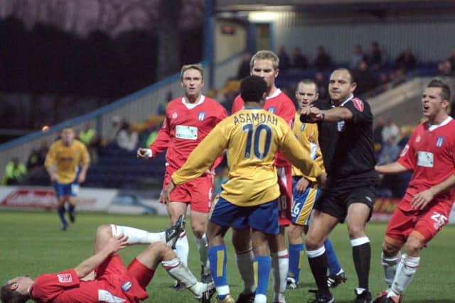 Derek Asamoah is sent off for Stags in an FA Cup tie when Colchester last visited Field Mill back in 2004.