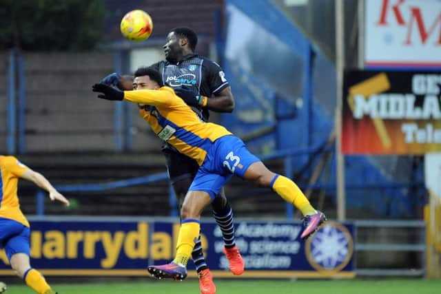 Mansfield Town v Colchester United.Ashley Hemmings in first half action.