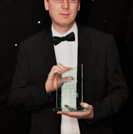 Ricky Scott, from The Beech Academy, with his award.