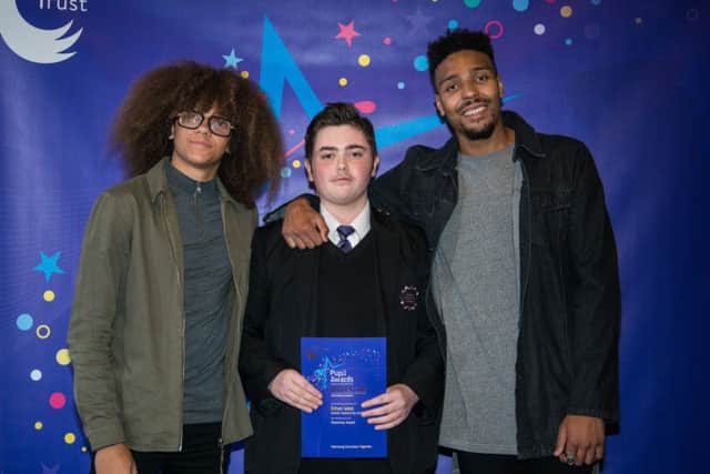 Ethan West with the Diversity duo.