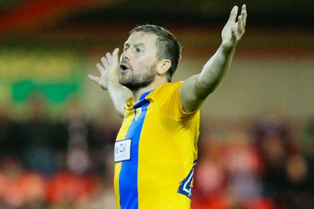 Mansfield Town's Jamie McGuire - Pic by Chris Holloway