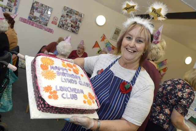 Lynds Close Luncheon club in Edwinstowe. Sue Howells with a birthday cake for the club Picture: Sarah Washbourn / www.yellowbellyphotos.com
