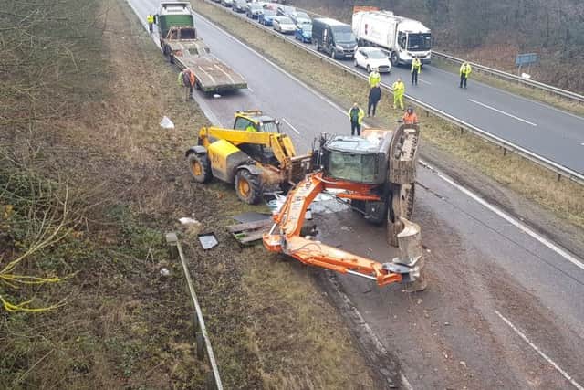 A digger which fell off the back of a lorry on the A617 near Chesterfield (Photo: Max Parkin).