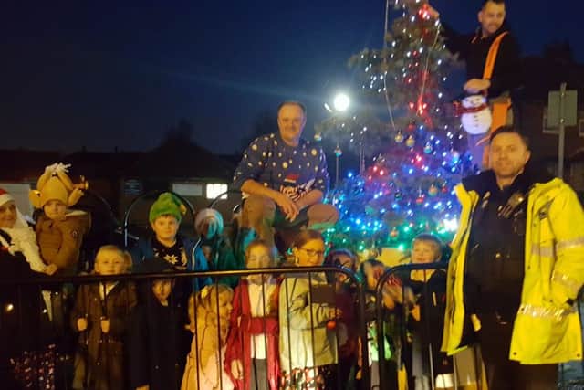 Selston residents decorate the village Christmas tree after an appeal on the #SelstonTogether Facebook group.