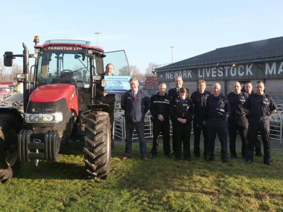 Pictured are PCC Paddy Tipping, Mr Andy Guy (NFU), Sgt Mike Taylor, Special Constable Alan Marwood, PCSO Katie Hyde, firefighter Scott Hutchinson, watch manager Neil Gaskin, crew manager Chris Tate and firefighters Paul Sykes and Mark Bottomley. (Image: Newark Advertiser)