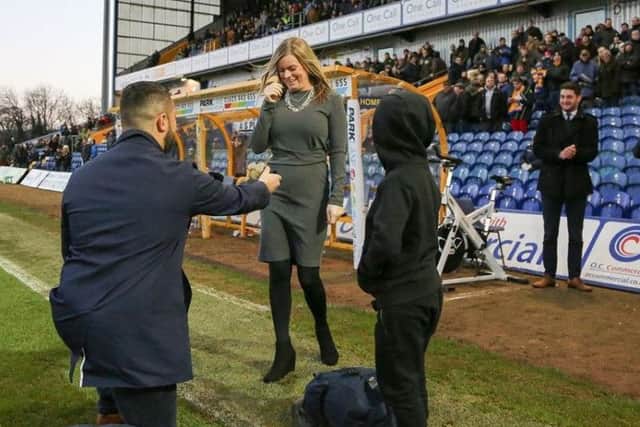 Stags fans cheered as a supporter proposed to his new fiance at the pitchside.