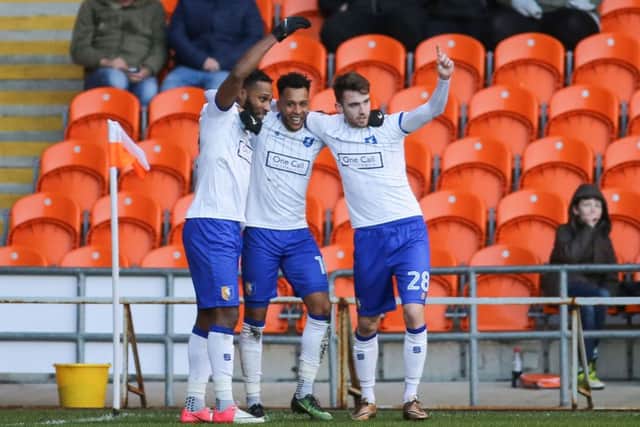 Mansfield Town's Matt Green celebrates with Yoann Arquin and Ben Whiteman - Pic Chris Holloway