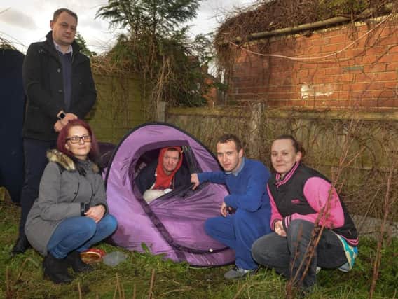 Local residents looking after a homeless man who is living in a garden in Sutton. Pictured with Terence Thompson are Coun Jason Zadrozny, Naomi Carlisle, Kyle Evans and Sarah Madigan