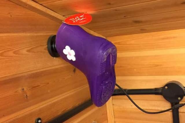 The burglars covered a CCTV camera with a child's welly before making off with thousands of pounds' worth of stock
